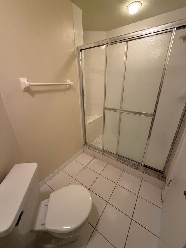 Building Photo - First floor condo in gated East Lake Woodlands of Oldsmar with one car garage