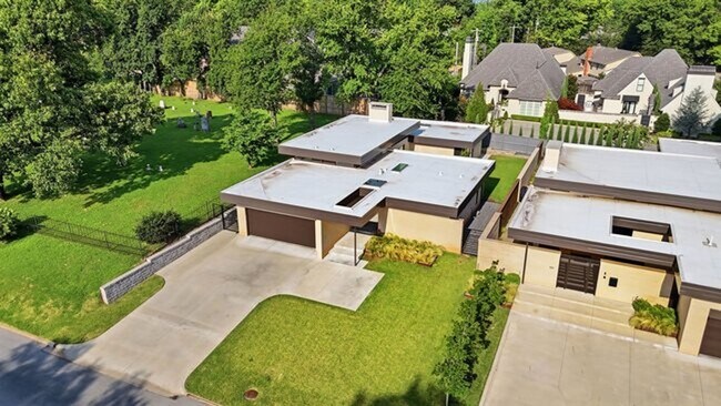 Building Photo - Experience contemporary luxury in this exceptional custom-built Midtown Tulsa residence, where so...