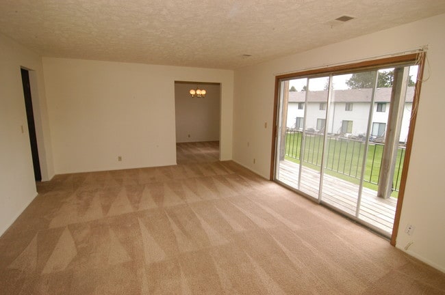 living room of walk-thru style - Gold Coast Apartments
