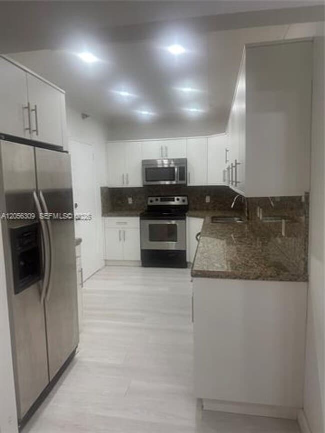 Building Photo - 10185 Collins Ave