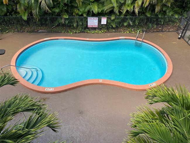 Building Photo - 2700 Coral Springs Dr