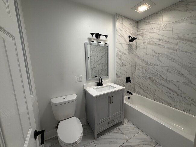 Building Photo - 7823 S Colfax Ave