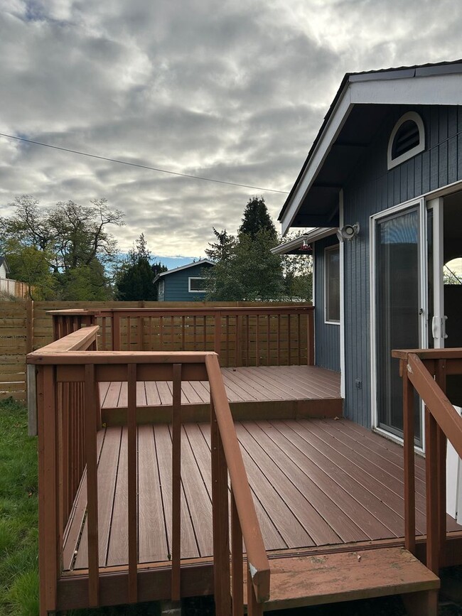 Building Photo - Fenced Backyard in our Charming 3+BR Corne...