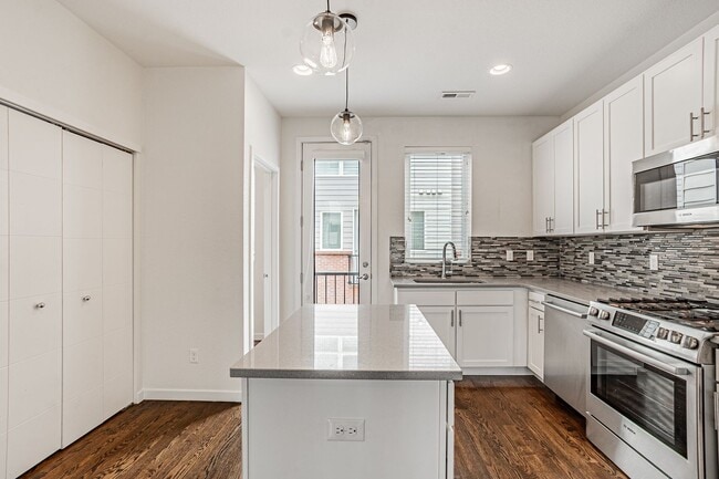 Building Photo - Modern 2BD, 3BA RiNo Townhome with Garage and Rooftop Deck