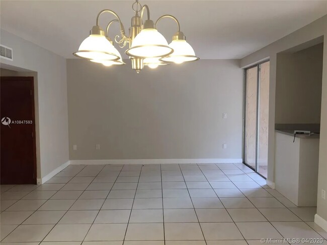 Living room on the first floor - 9195 Fontainebleau Blvd