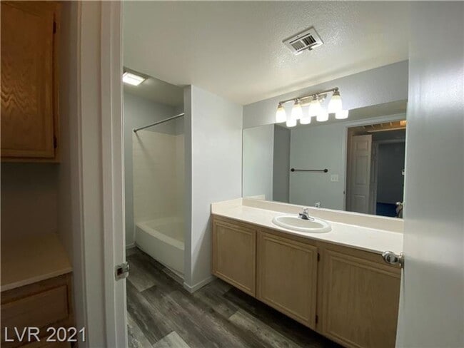 Building Photo - Charming 1-Bedroom Condo in Gated 89128 Co...