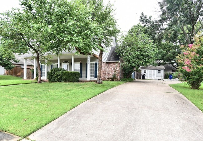 Building Photo - Look at that amazing Front Porch!! Room to gather inside and out.