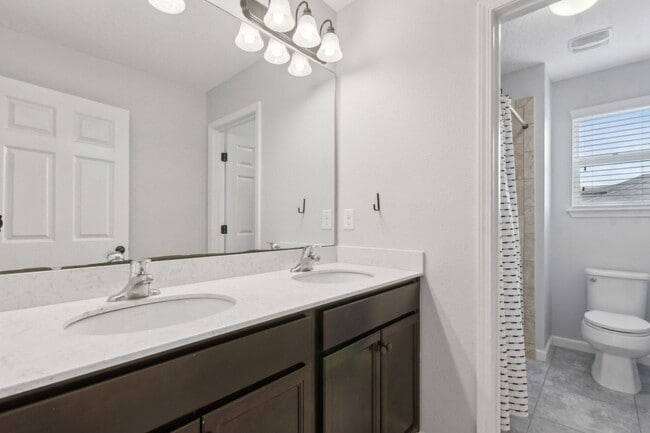 Building Photo - Spacious 4-Bedroom Home in Amelia Walk wit...