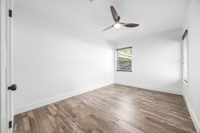 Building Photo - **$40K+ IN UPGRADES AND A FENCED BACKYARD WITH TWO STORAGE BUILDINGS**
