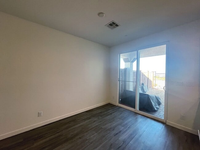 Building Photo - Single-story 1326 sq ft, townhome built in 2019 w/3 bed, 2 bath & spacious attached 2-car garage ...