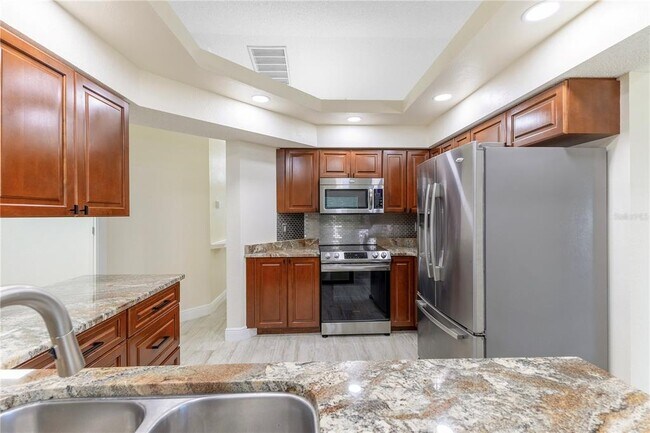 Building Photo - 7445 Mengi Cir
