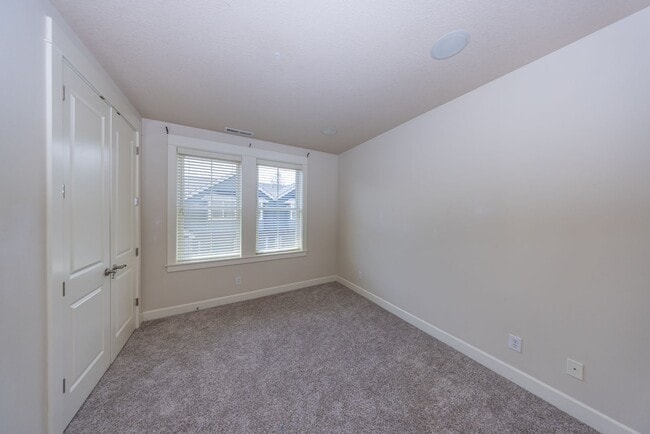 Building Photo - 2 Creeks Condominiums - Gated Community on Camas Meadows Golf Course