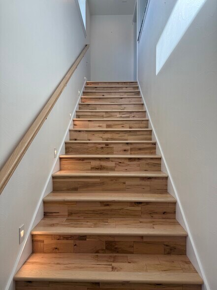 Stairs and upstairs are all Canadian maple hardwood - 1184 Rutherford Dr