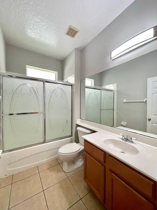 Building Photo - SOUTHEAST ORLANDO  - NICE UPGRADED HOUSE IN TIVOLI WOODS VILLAGE