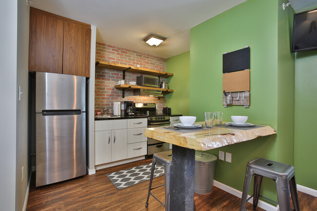Building Photo - Fully Furnished Suites Available!