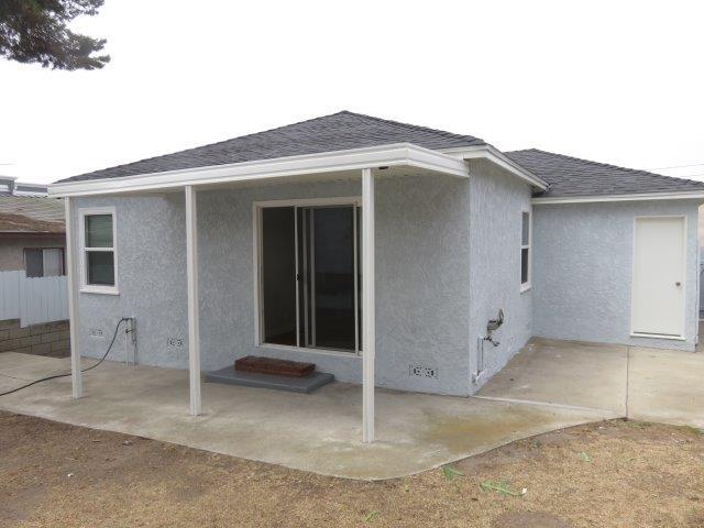 2nd bedroom opens to covered patio and backyard. - 1070 10th St
