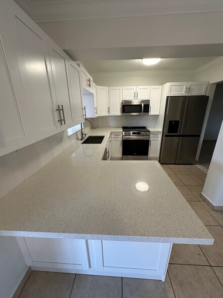 New counter tops - 403 SW 78th Pl