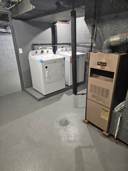 Laundry room accessed through garage with brand new washer/dryer - 4355 Coleridge St