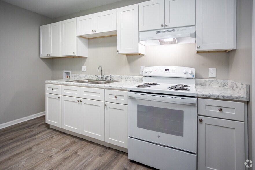 2BR, 1BA - 900SF - Kitchen - The Village Apartments