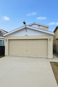 Building Photo - 10739 Mona Blvd