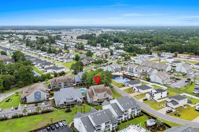 Building Photo - Long Term Furnished Top Floor Condo - 2 bed/2bath with Community Pool