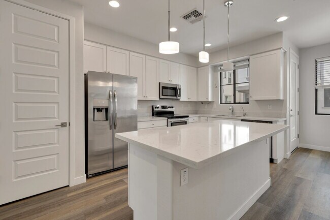 Building Photo - Sophisticated Camelback Corridor Tri-Level Townhome now available!