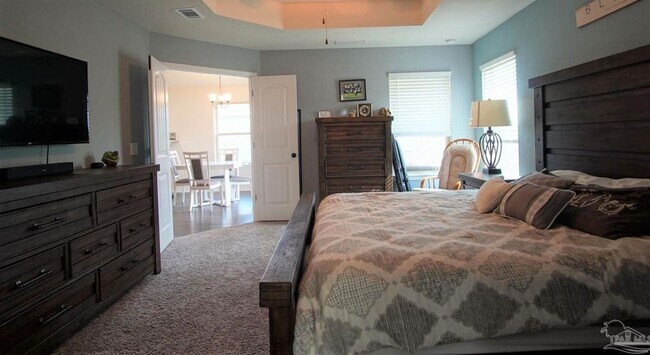 Building Photo - Popular Floor Plan, Almost New Home in Woo...