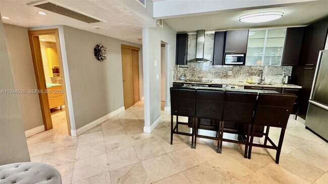 Building Photo - 19390 Collins Ave