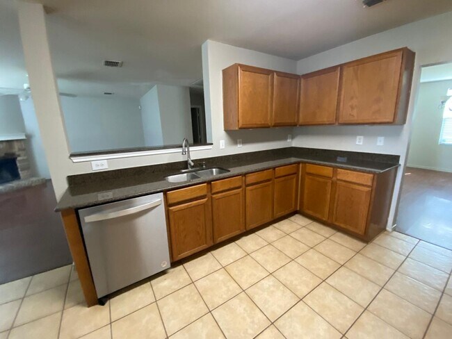 Building Photo - Formal Living and Dining on both sides of ...