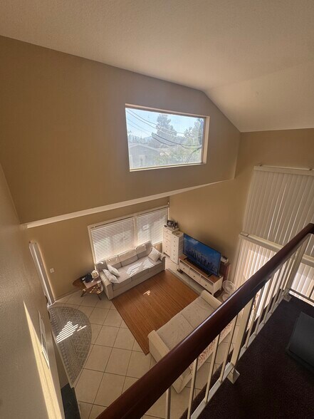 LIVING ROOM VIEW FROM UPSTAIRS - 4179 Ironwood Dr