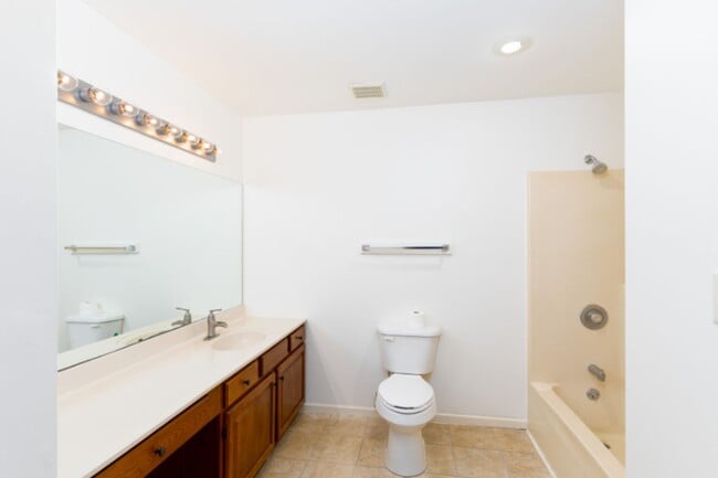 Building Photo - Fantastic Location! Close to MKT & Twin Lakes! 3BR/2.5BA/2000sqft., 2-Car Garage, Large Fenced Ya...