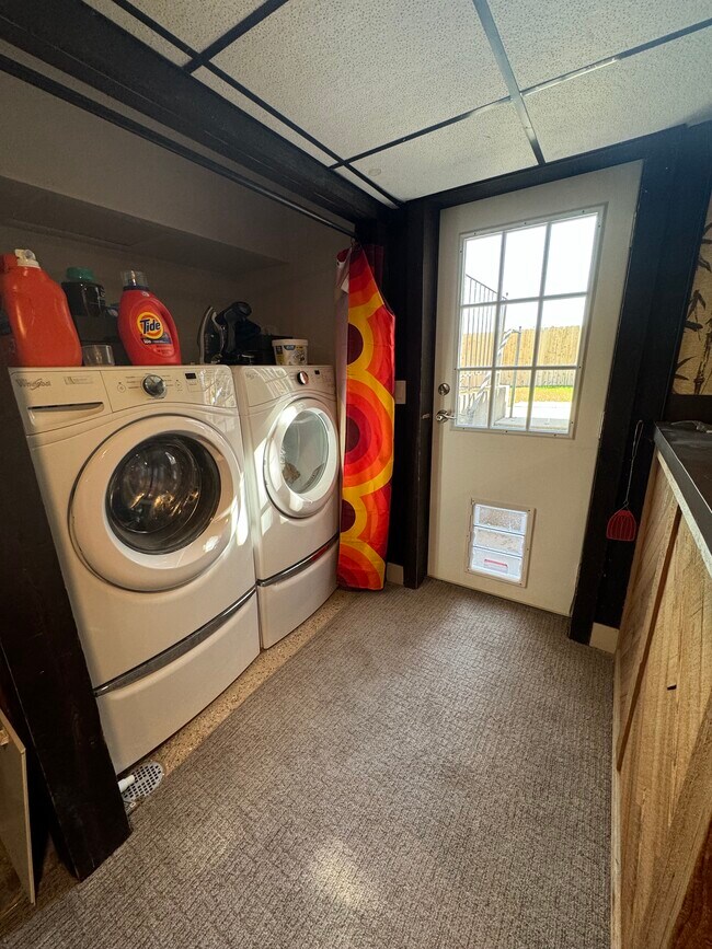 Laundry closet and basement entrance to home - 8717 S Royal Crest Dr