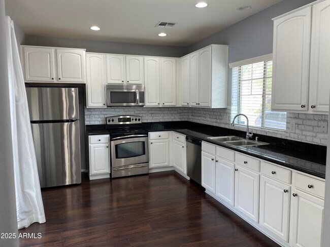 Building Photo - 14240 W Country Gables Dr