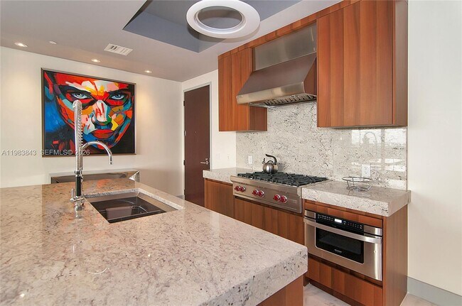 Building Photo - 9705 Collins Ave