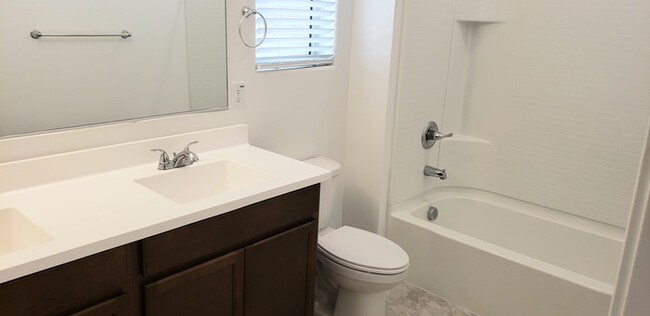Building Photo - The 2 YEARS NEW 4 bedroom + 3 car garage r...