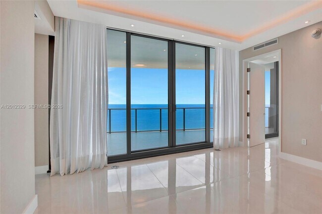 Building Photo - 15701 Collins Ave