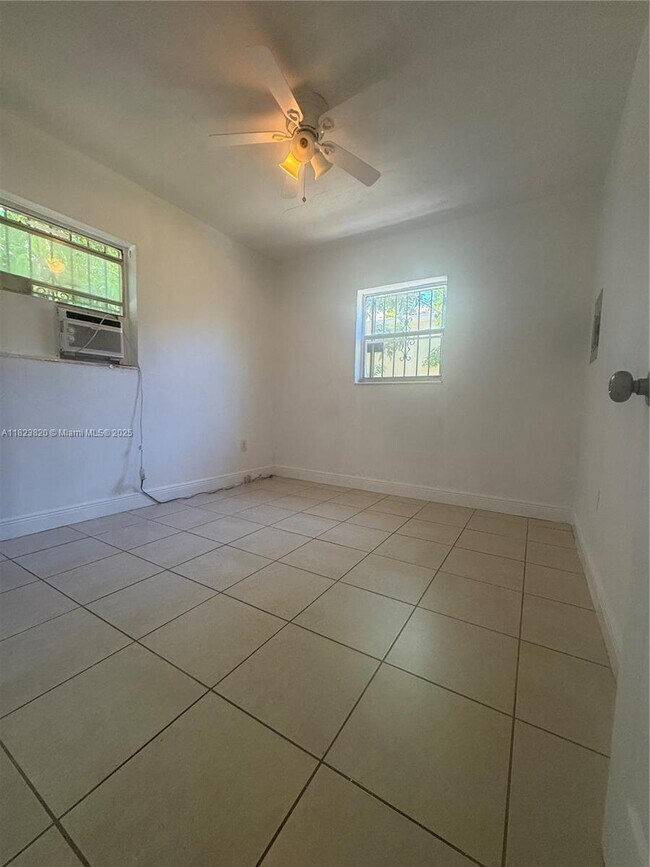 Building Photo - 1590 NW 56th St
