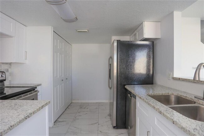 Building Photo - 202 Washington Palm Loop