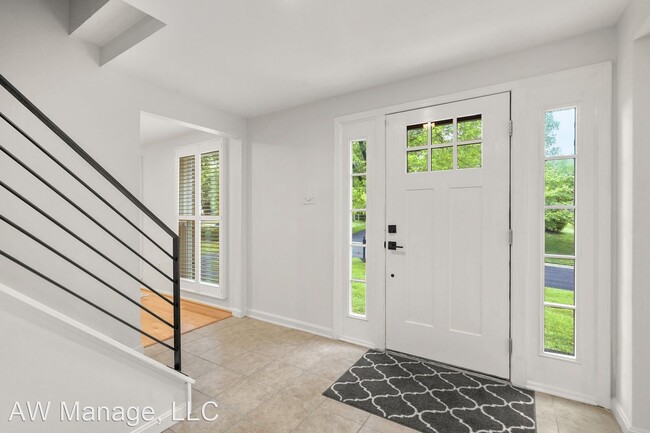 Building Photo - 4 br, 3.5 bath House - 14817 Soft Wind Dr