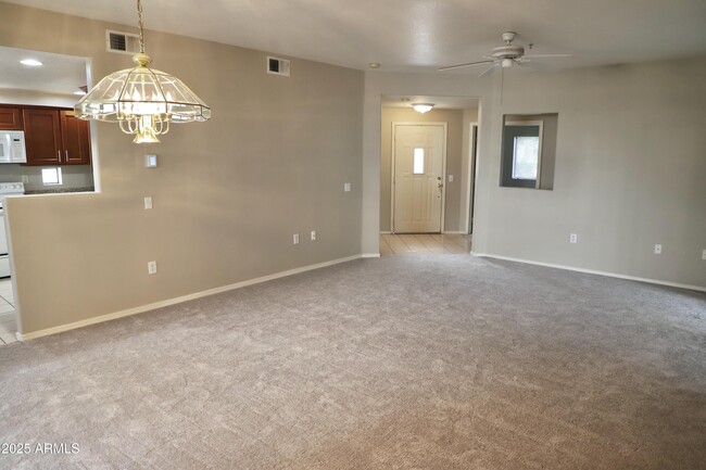 Building Photo - 9555 E Raintree Dr