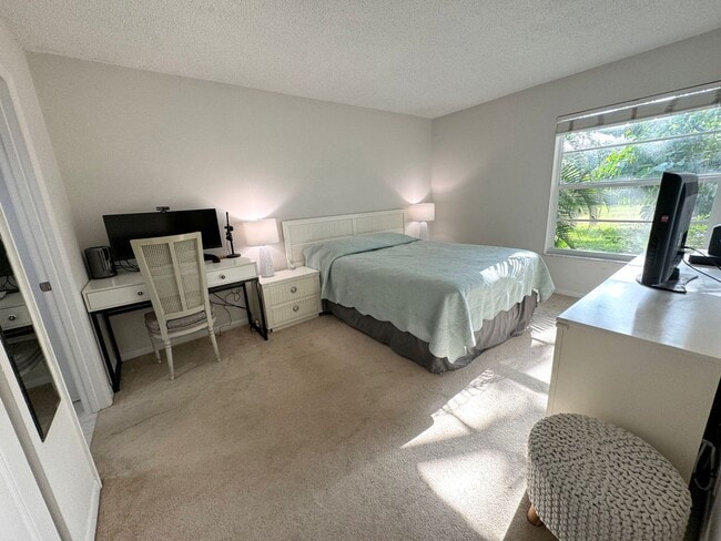 Building Photo - 5-Min Walk to FAU – Private Room in Furnished 2/2 Condo w/ Pool & Canal Views – $1,700