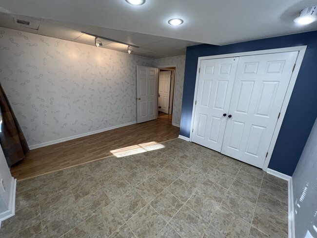 Bedroom 1 just down the hall way with closet. - 3617 Sunset Rdg