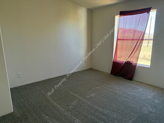 Building Photo - New Year Special! 50% Off First Month's Rent!