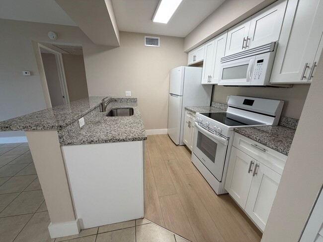 Building Photo - ANNUAL RENTAL - 2 BED / 2 BATH CONDO AT MYSTIC GARDENS