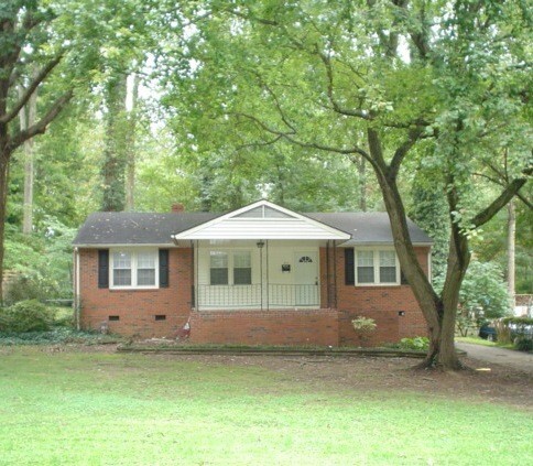 Primary Photo - Ranch Style House with a Fenced-in Back Ya...