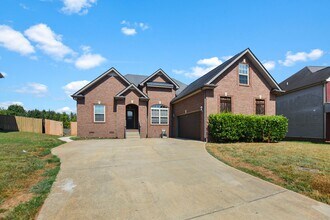 Building Photo - Pet Friendly Three Bedroom with Bonus!