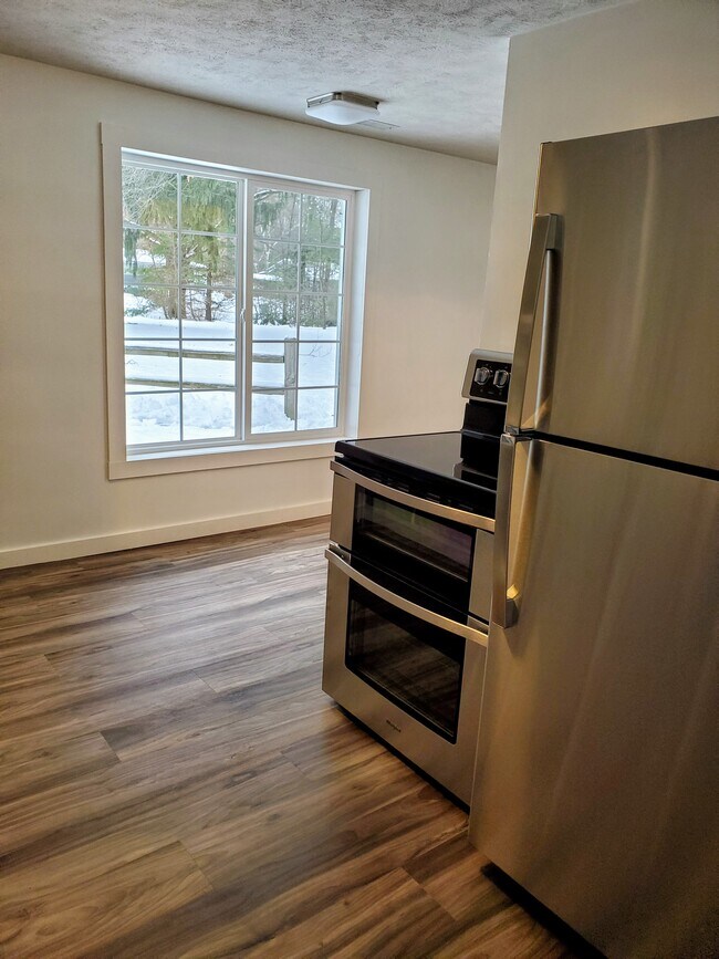 Kitchen area and walkway - 624 E Lewis St