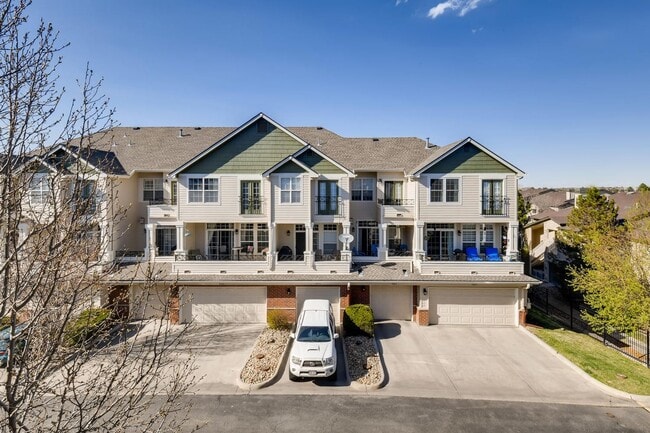 Building Photo - Stunning 3-bed 3-bath townhome that features hardwood floors and an attached 2-car garage!