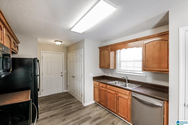 Building Photo - 1597315973 Stone Ridge Cir