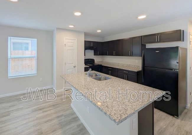 Building Photo - 9027 Cocoa Ave